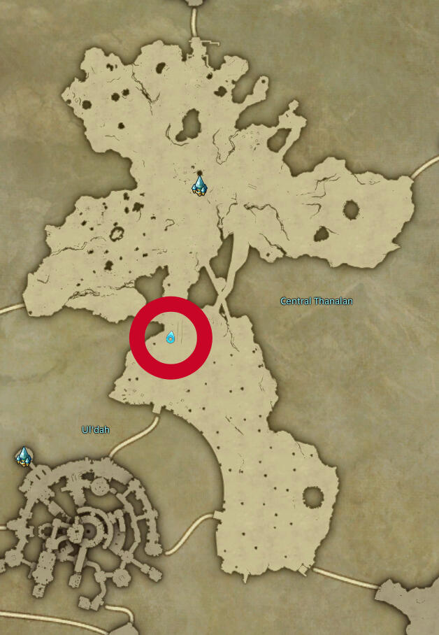 Screenshot of a game map, showing a long wide area partially split in half in the center, horizontally, and bordering to the city of Ul'dah in the bottom left corner. There is a marker in the middle just below the divide.